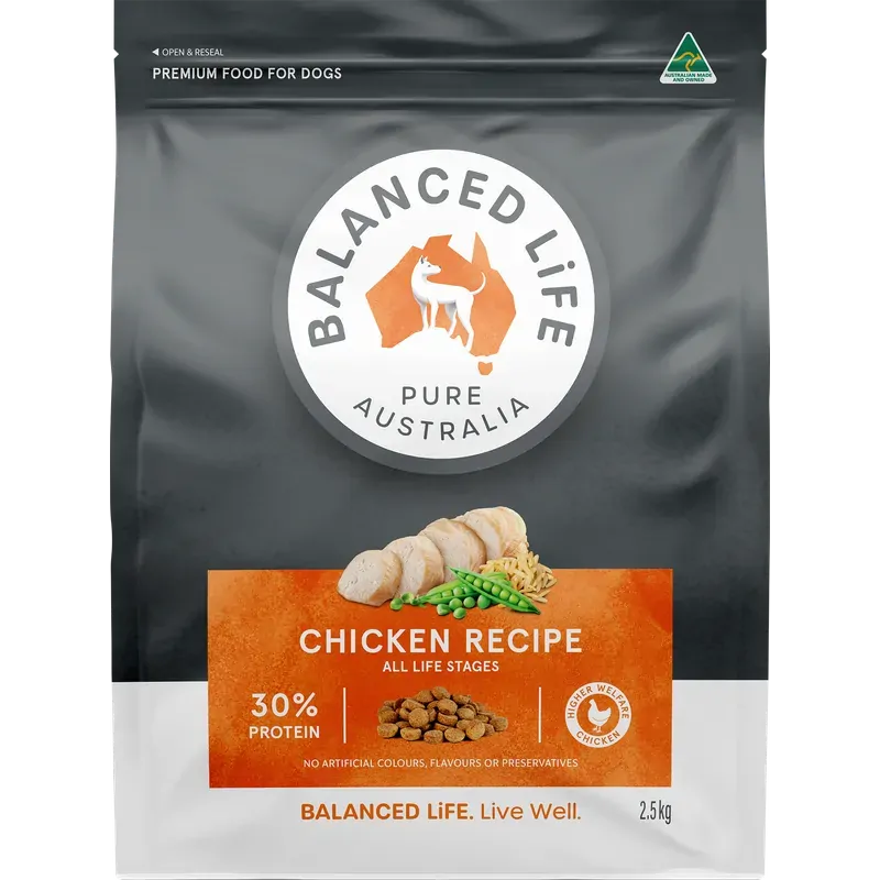 Balanced Life Pure Australia dog food package with chicken recipe on a gray background